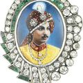 A diamond and emerald pendant depicting an Indian prince, France for the export market, circa 1930