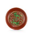 An iron-red and green enamelled 'Buddhist lions' dish, Jiajing six-character mark and of the period (1522-1566)
