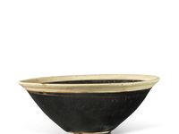 A Cizhou black and white-glazed conical bowl, Jin dynasty (1115-1234)