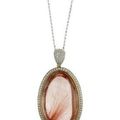 Pendentif  serti d'un important cabochon de rutile & Bague ornée d'un important quartz rutilé