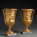 A pair of early 19th century Italian gilt bronze campagna form vases. Italy, ca 1810