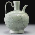 A rare early 'Yaozhou' relief-carved globular ewer, Five Dynasties-Northern Song Dynasty (907-1127)