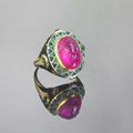 An art deco ruby, emerald sapphire and enamel ring, by Cartier, 1928