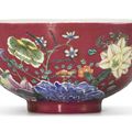 A ruby-ground famille-rose bowl, Early 20th century