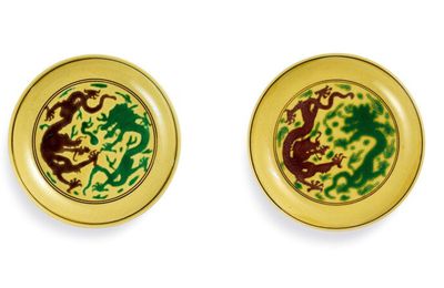 A pair of green and aubergine-enamelled yellow-ground 'dragon' dishes, Marks and period of Kangxi (1662-1722)