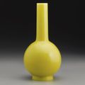 A yellow glass bottle vase. Qianlong mark and period. 
