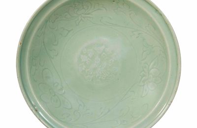 A Longquan celadon-glazed floral dish, Ming dynasty (1368-1644)