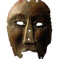 A carved wood Inupiaq mask, Ancient Eskimo, Alaska, 15th century