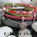 Multicolore et multimatières pour ce bracelet manchettes dans les tons vers anis, fuschia et violet agrémenté de breloques...