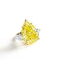 Fancy vivid yellow diamond and diamond ring, mount by Graff