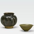 A Northern glazed stoneware melon-form jar and a small Yaozhou celadon glazed bowl, Song-Jin dynasty