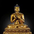 A large gilt-lacquered wood seated figure of Shakyamuni Buddha, Qing dynasty, Kangxi period (1662-1722)