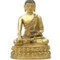 A gilt-copper figure of Shakyamuni Buddha, Tibet, circa 16th century