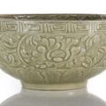 A very large and deep bowl with celadon glaze and floral decoration, Longquan ware, China, Yuan-early Ming dynasty. 