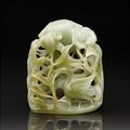 A green jade reticulated hat finial