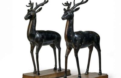 A rare and monumental pair of bronze 'deer' censers, Incised Qianlong six-character marks within rectangles and of the period (1