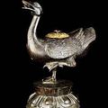 A bronze 'duck' incense burner with a gilded cover. Early Ming dynasty