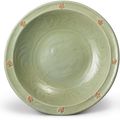 A 'Longquan' celadon-glazed and biscuit-decorated dish, Yuan dynasty (1279-1368)