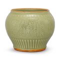 A Longquan celadon 'Eight Immortals' jar, Yuan dynasty (1279-1368)