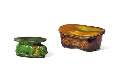 A green and amber-glazed rabbit-form pillow and a Chengguan sancai-glazed carved ‘wave’ bean-shaped pillow