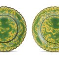 A pair of yellow-ground green-enamelled 'dragon' foliate dishes, Seal marks and period of Qianlong