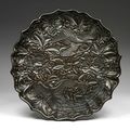Carved black lacquerware eight-lobed dish, Late Yuan to early Ming dynasty, second half of the 14th century