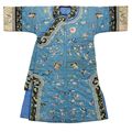 A sky-blue-ground silk woman's padded winter robe, Late Qing Dynasty
