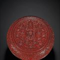 A rare large carved cinnabar-lacquer box and cover, Qing dynasty, 18th century