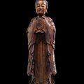 A fine and large gilt, red and black-lacquered wood figure of Guanyin, late Ming-early Qing dynasty