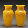 A pair of yellow Peking glass baluster vases