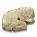 A small greyish-green jade 'buffalo’, Late Shang-Early Western Zhou Dynasty, 12th-10th century BC