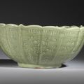 A large Longquan celadon carved lobed 'lotus' bowl, Yuan-early Ming Dynasty