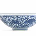 A Ming-style blue and white 'floral meander' conical bowl, Yongzheng six-character mark and of the period (1723-1735)