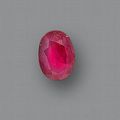 An unmounted oval mixed-cut ruby