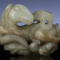 A small celadon jade carving of a mythical beast, longma, Ming dynasty, 16th-17th century