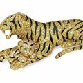 A colored diamond, diamond, emerald and enamel tiger and cub brooch, by Van Cleef & Arpels.