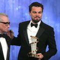 US actor Leonardo Di Caprio holds the -Golden Star -, he received from US director Martin Scorsese 