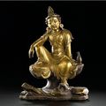 A gilt-bronze figure of 'Water-Moon' Avalokiteshvara, Ming dynasty, 17th century