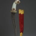 A gem-set and gold-inlaid jade-hilted dagger. Mughal India. 18th century