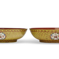 A pair of enameled coral and yellow-ground dishes, Guangxu period (1875-1908)