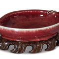 A red-glazed 'Peach' washer, Qing dynasty, 19th century