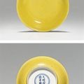 A small yellow-glazed dish. The porcelain with Xuande six-character mark 