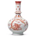 An iron-red decorated 'dragon' bottle vase, Yongzheng six-character mark in underglaze blue and of the period (1723-1735)