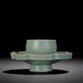 A Korean celadon stoneware cup stand, Koryo dynasty, early 12th century