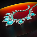 A turquoise and diamond necklace and earclips, circa 1960