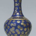 A blue-ground gilt-decorated bottle vase, Guangxu six-character mark and of the period (1875-1908)