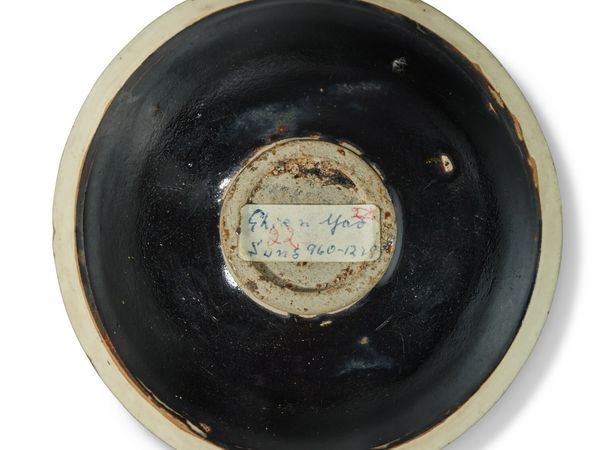 A Cizhou black and white-glazed conical bowl, Jin dynasty (1115-1234)