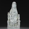 A Dehua seated Guanyin and attendants, 17th-early 18th century