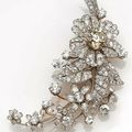 A late Victorian colored diamond, diamond and platinum-topped flower brooch