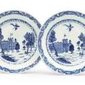 A pair of Chinese Export blue and white "Burghley House" plates,  circa 1745